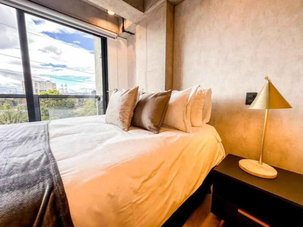 Apartment Skyline Suites - Elegant Living With Coworking & Scenic Views Bogota